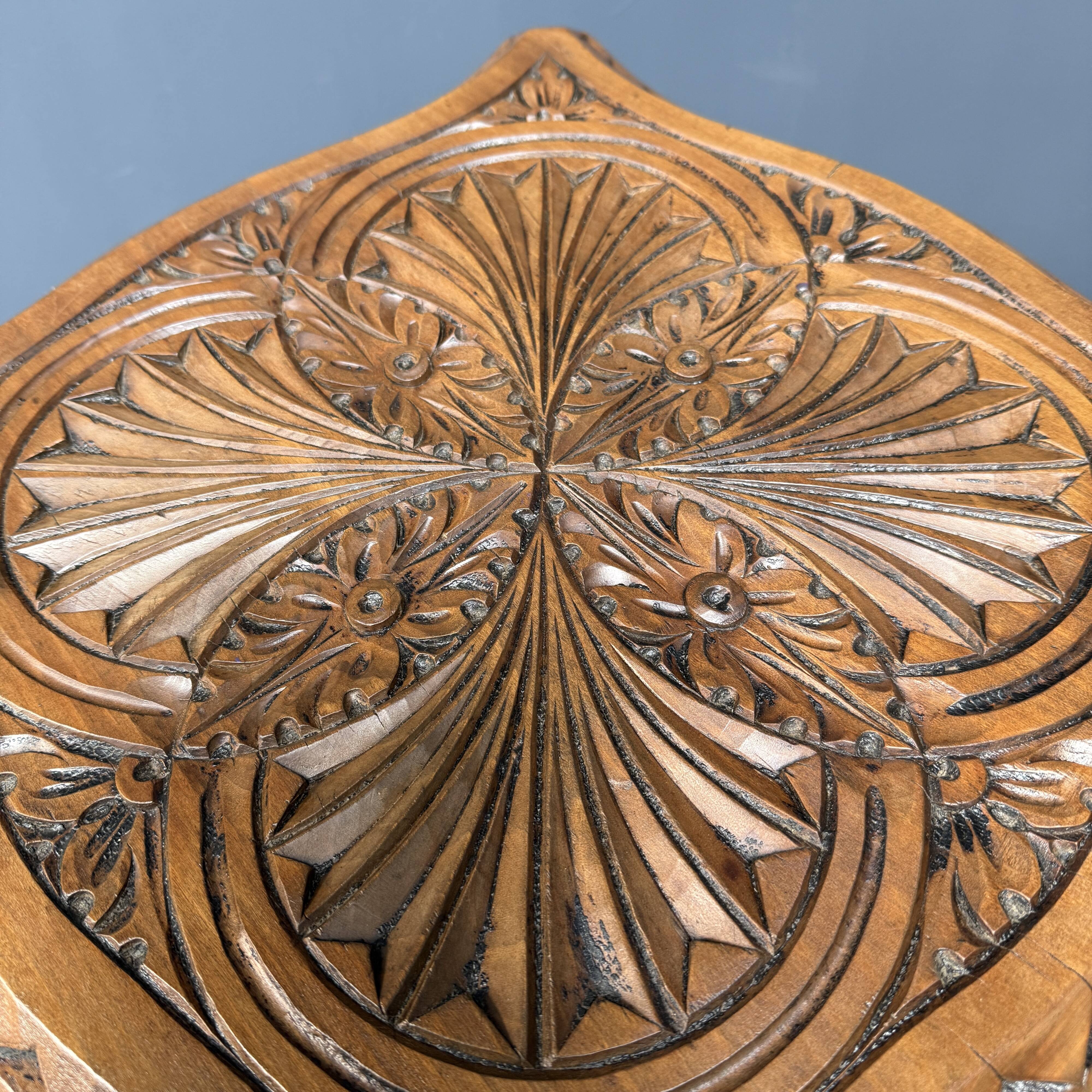 Graceful antique carved wooden side table