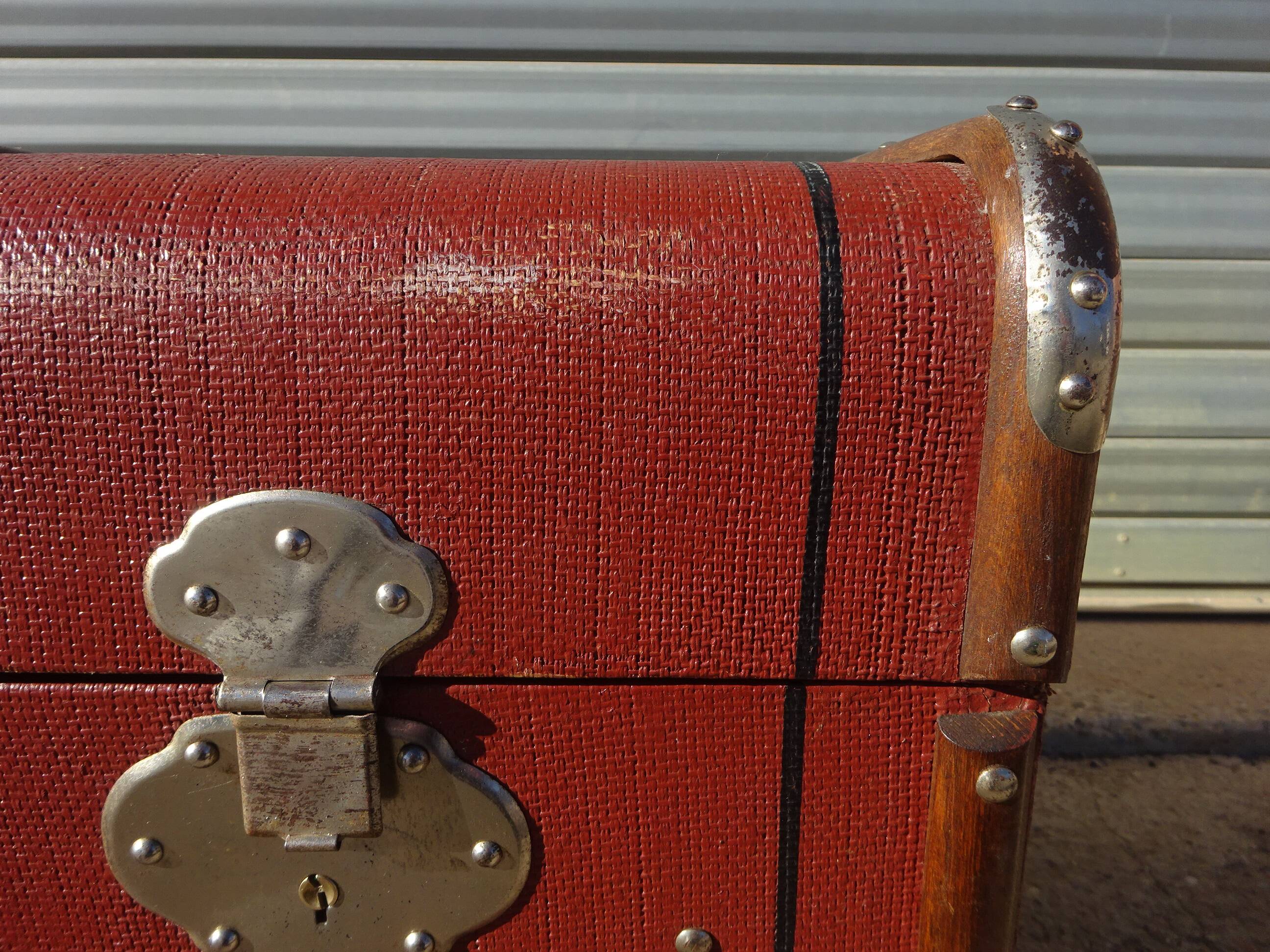 Old curved travel trunk