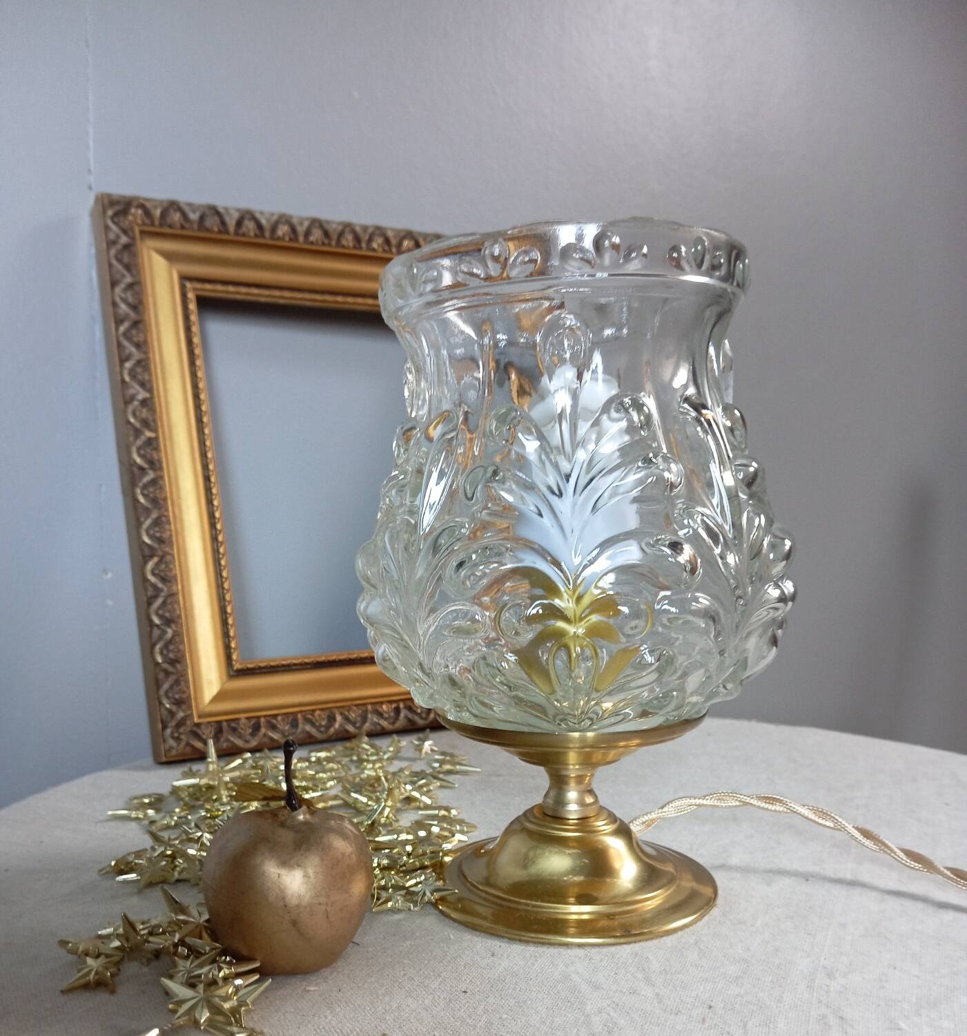 Brass foot table lamp, transparent textured molded globe, art deco style