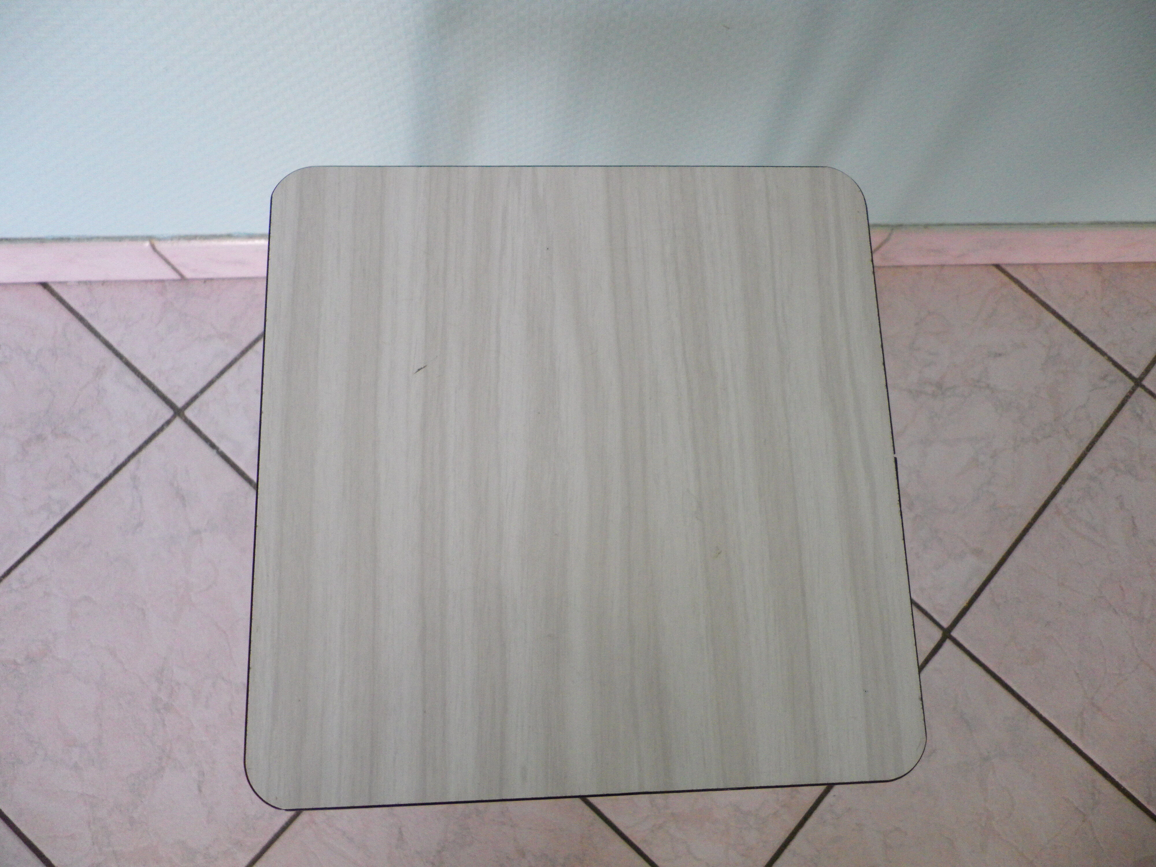 White formica stool with gray zebras from the 60s