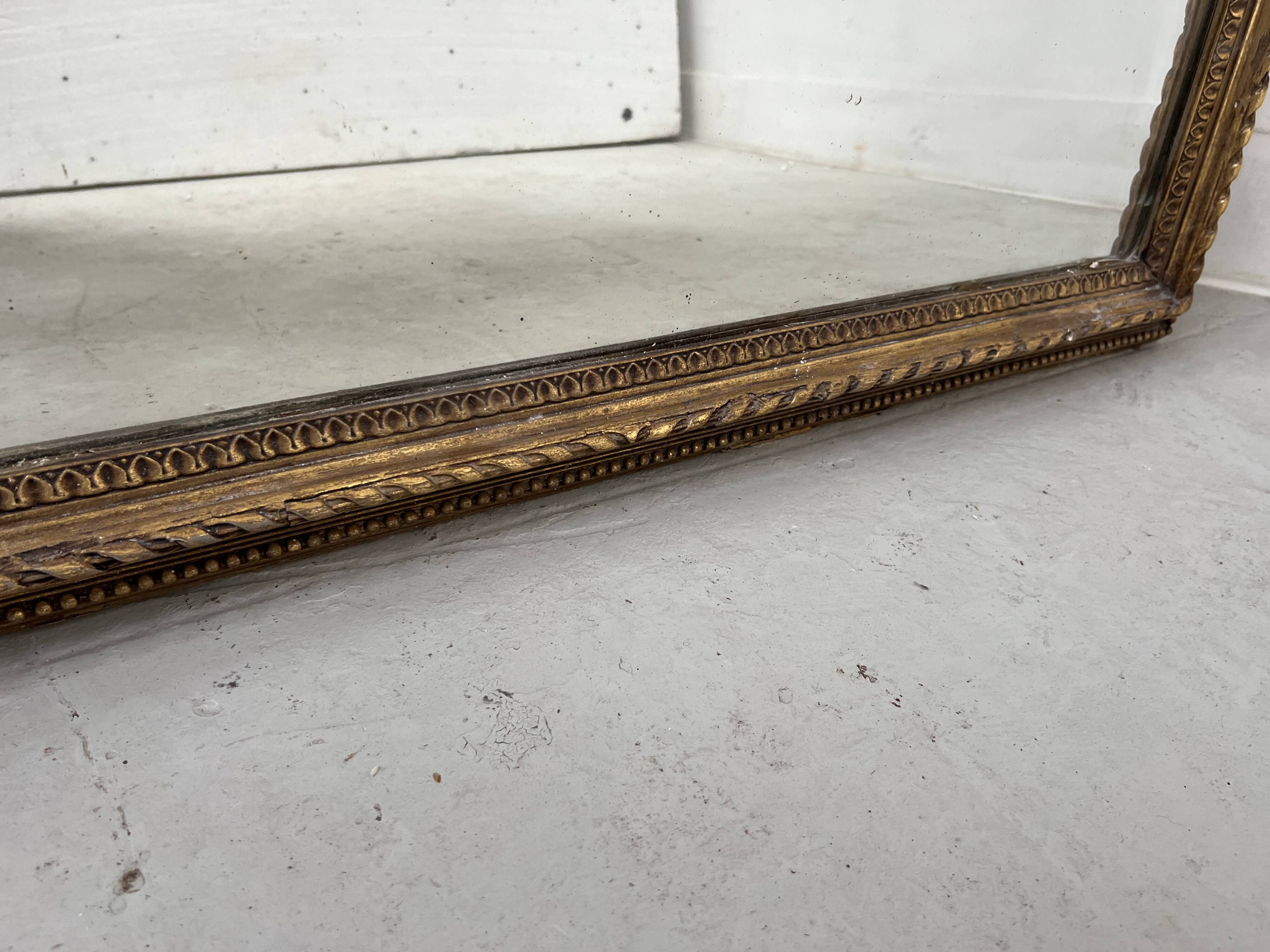 Louis XVI style mirror in wood and gilded stucco, 19th century