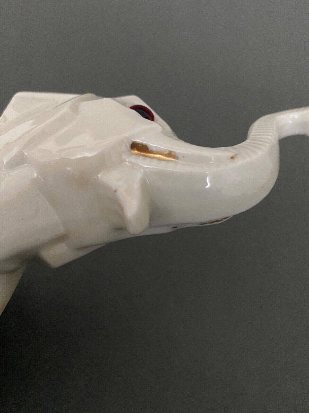 Art Deco 1930 elephant night light in white porcelain