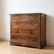 Antique walnut chest of drawers with 4 drawers.