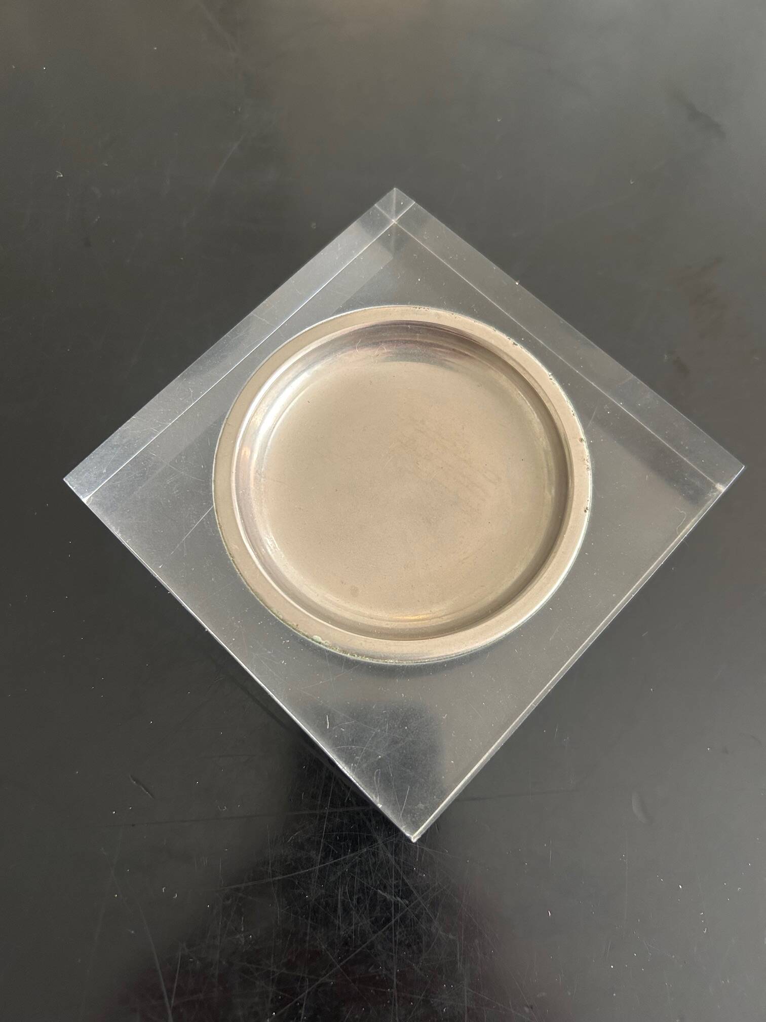 Plexiglass pocket emptier 1970