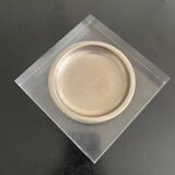 Plexiglass pocket emptier 1970