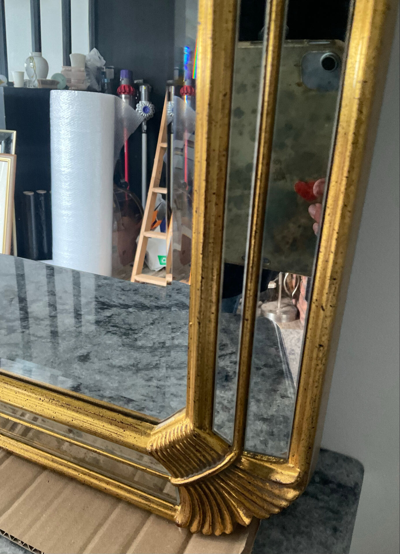 Large gold mirror by Deknudt with parcloses from the 1970s.