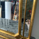 Large gold mirror by Deknudt with parcloses from the 1970s.