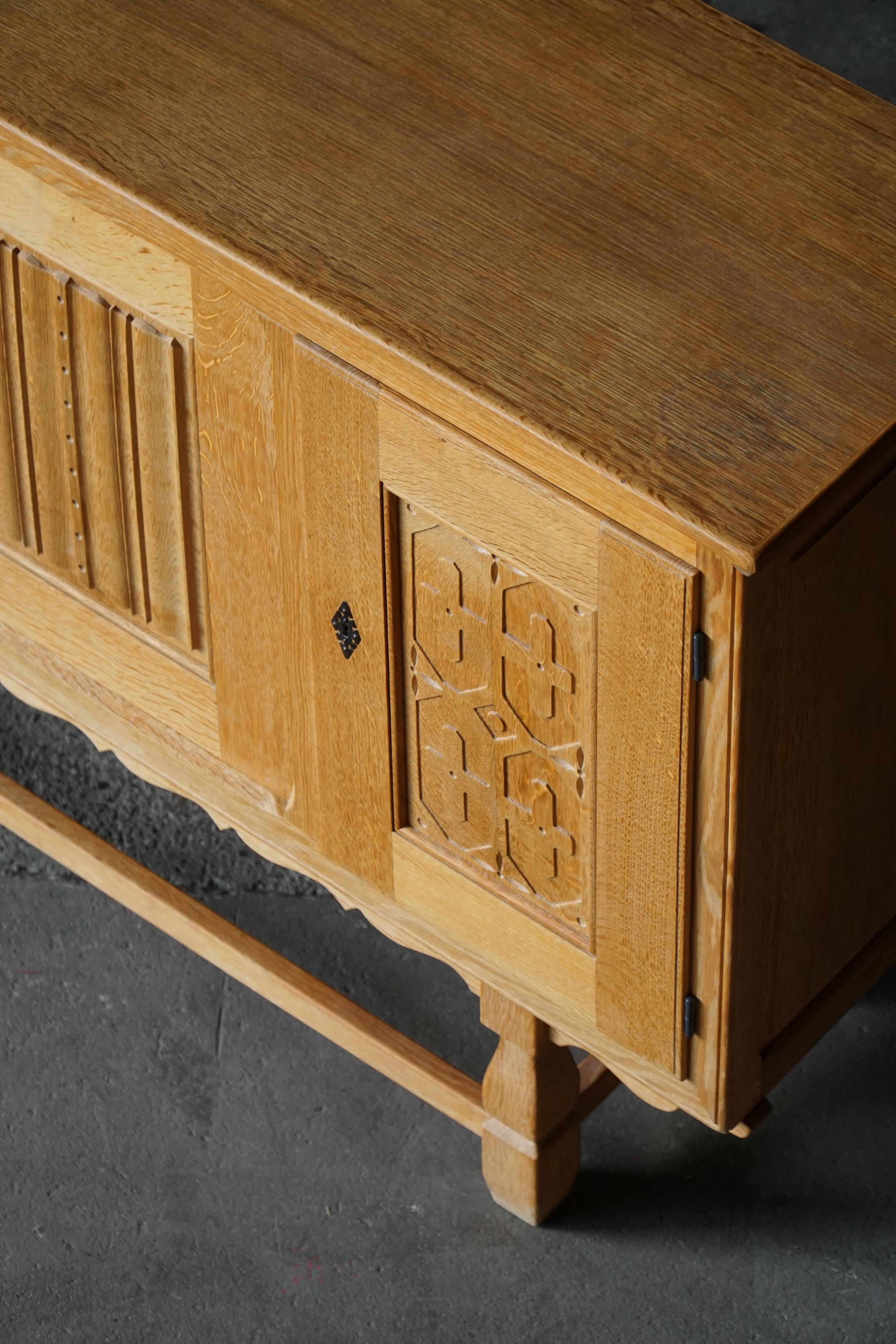 Henning Kjærnulf for EG Møbler, solid oak sideboard, Danish modern, 1960s.