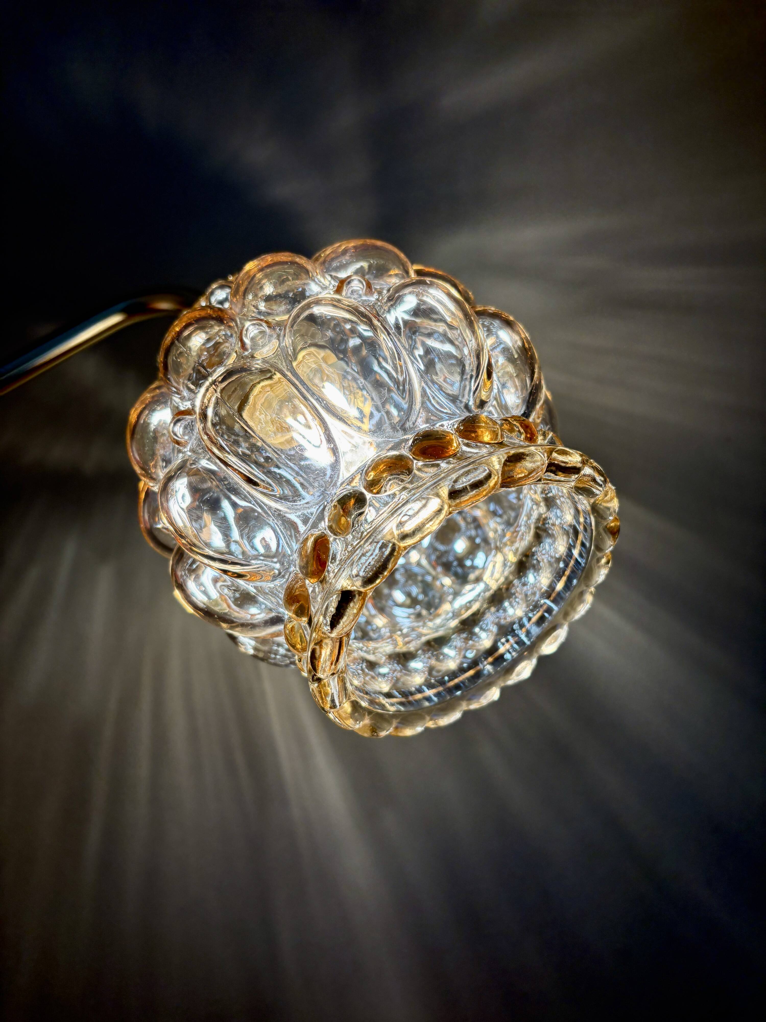 Vintage globe angled wall light in bubbled glass