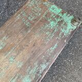 Pair of green teak coffee tables.