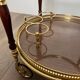 Oval Rolling Table in Brass and Mahogany with Openwork Gallery and Bottle Holder