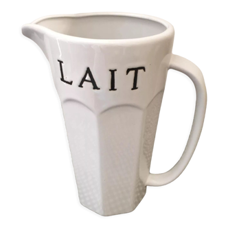 White ceramic milk pitcher