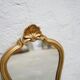 Miroir vintage de style baroque en bois doré