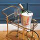 Brass wheeled bar cart