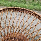 Old throne basket armchair in woven wicker