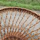 Old throne basket armchair in woven wicker