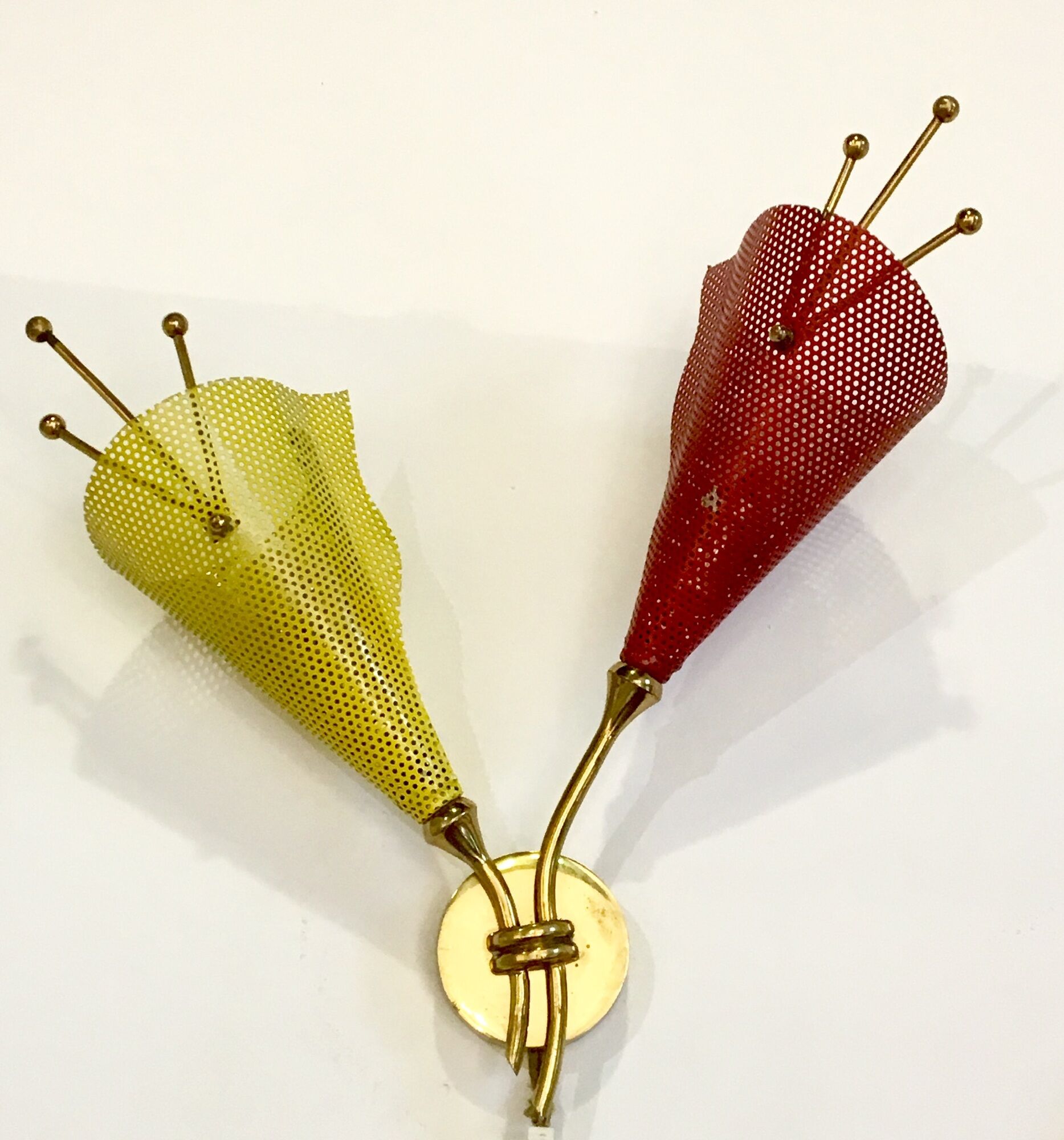 Pair of wall lamps metal perforated color, France 1950