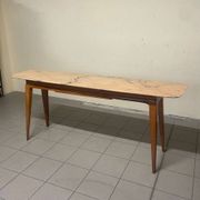 Console from the 1950s with a pink marble top and a cherry wood frame.