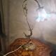 bronze and brass lamp with a magnificent blue moulded tulip, opalescent,