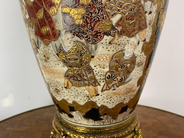 Satsuma porcelain vase from Japan and XIXth century gilded metal