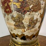 Satsuma porcelain vase from Japan and XIXth century gilded metal