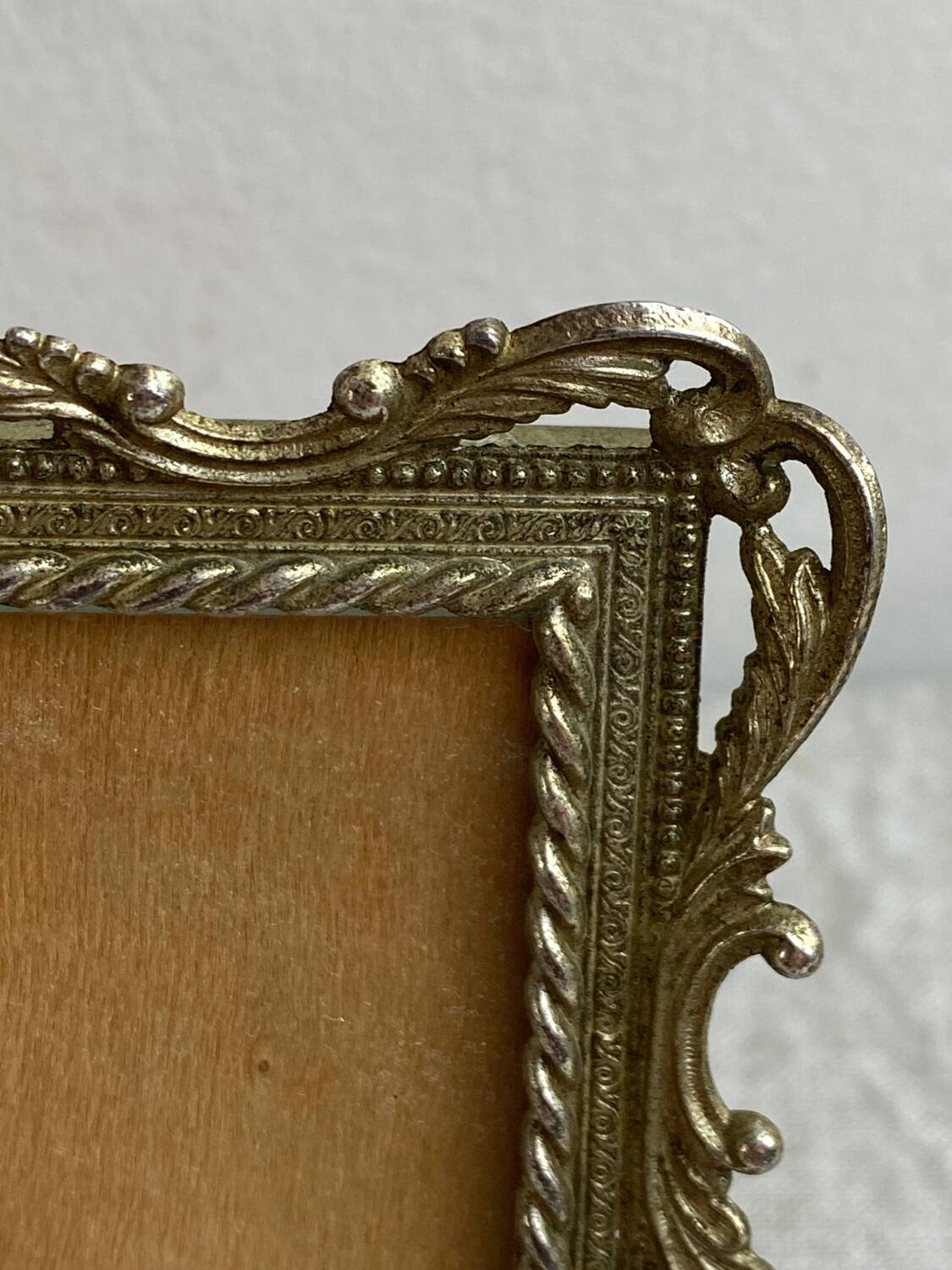 Italian gold metal frame on stand