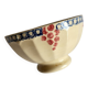 Bol ancien en faïence beige à motif de raisin