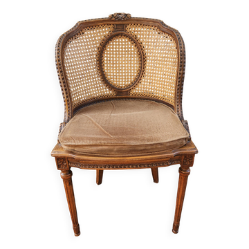 Antique Louis XVI chair in wood and cane from the 19th century.