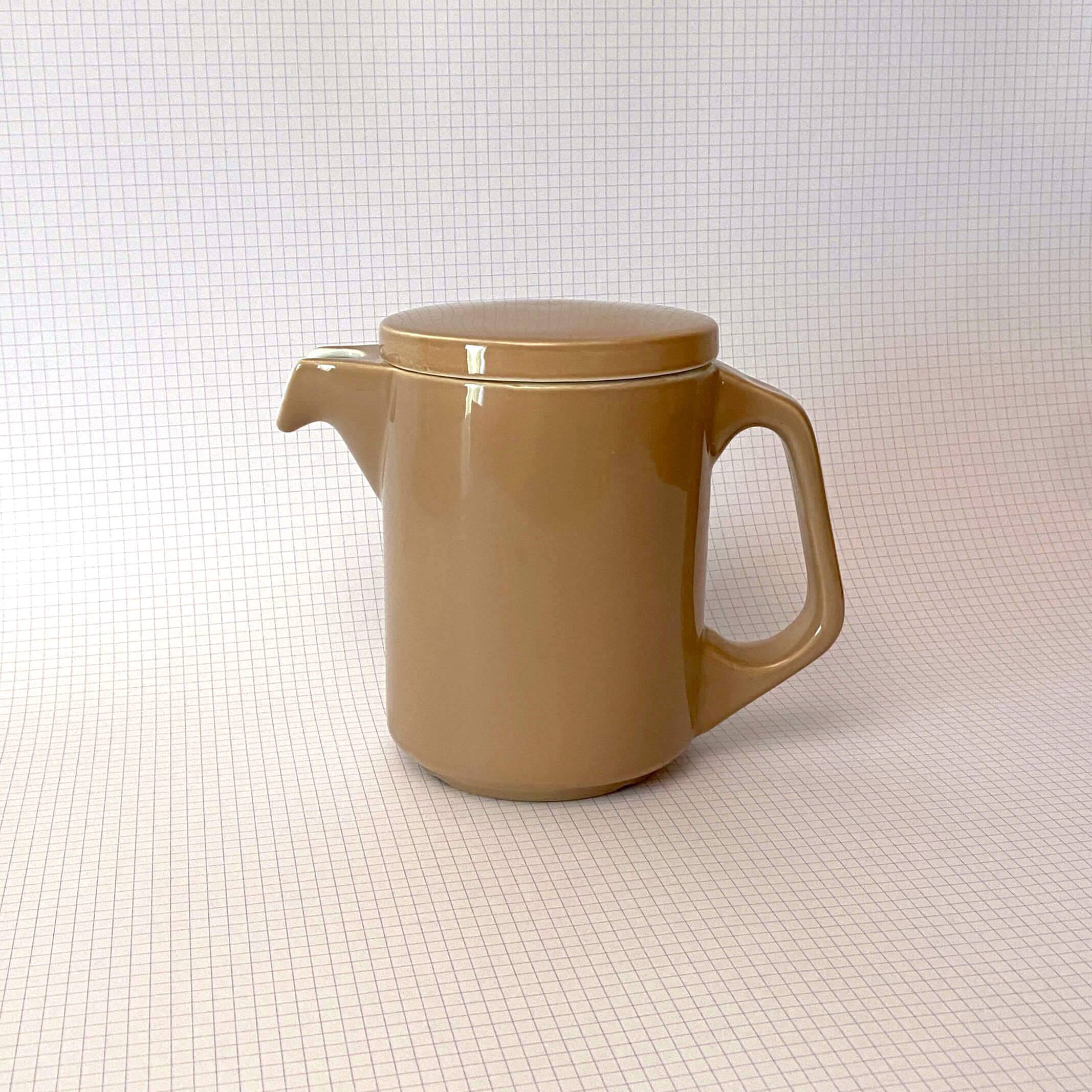 Brown ceramic pitcher