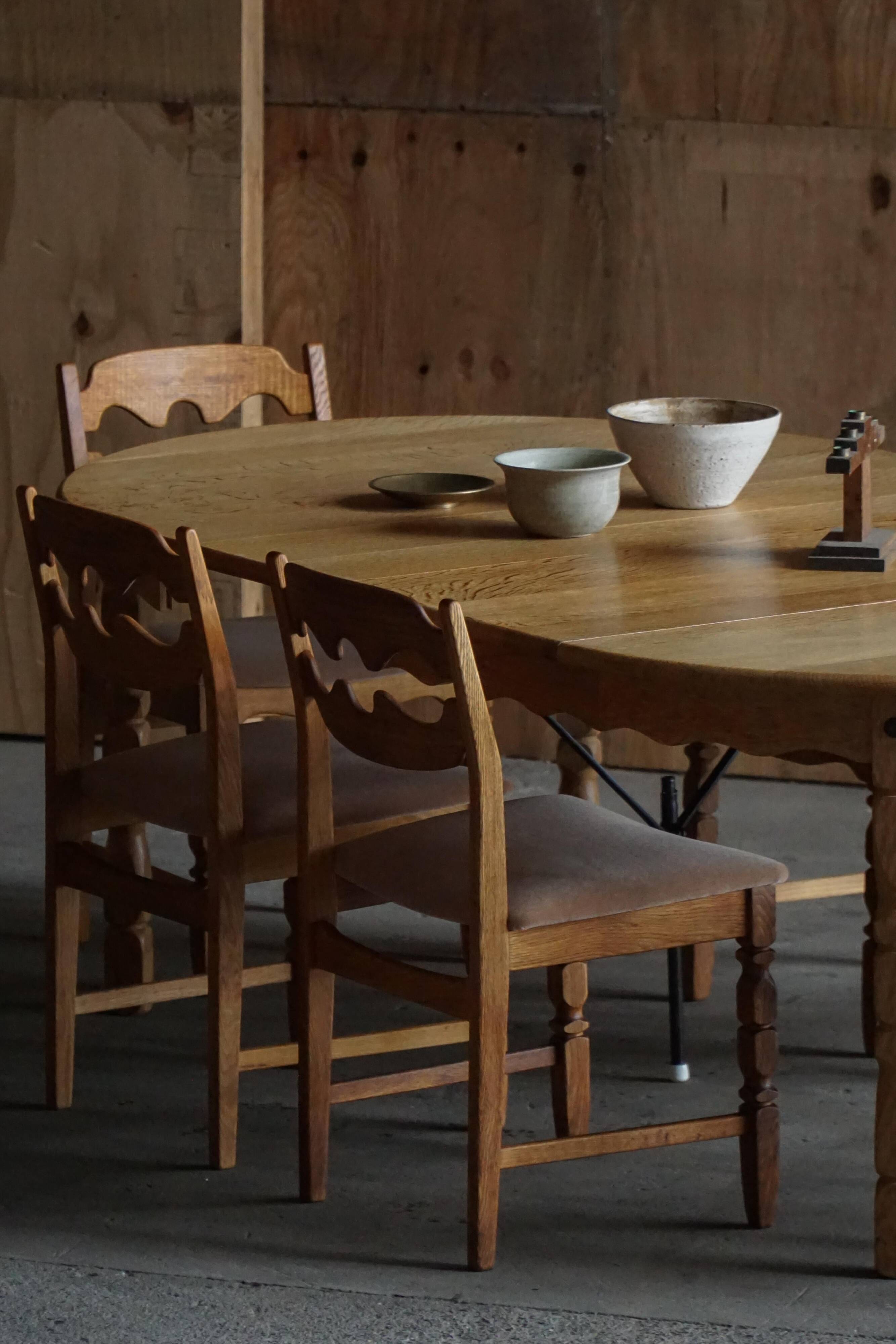 Table à manger ronde en chêne massif avec deux rallonges, milieu du siècle danois, années 1960
