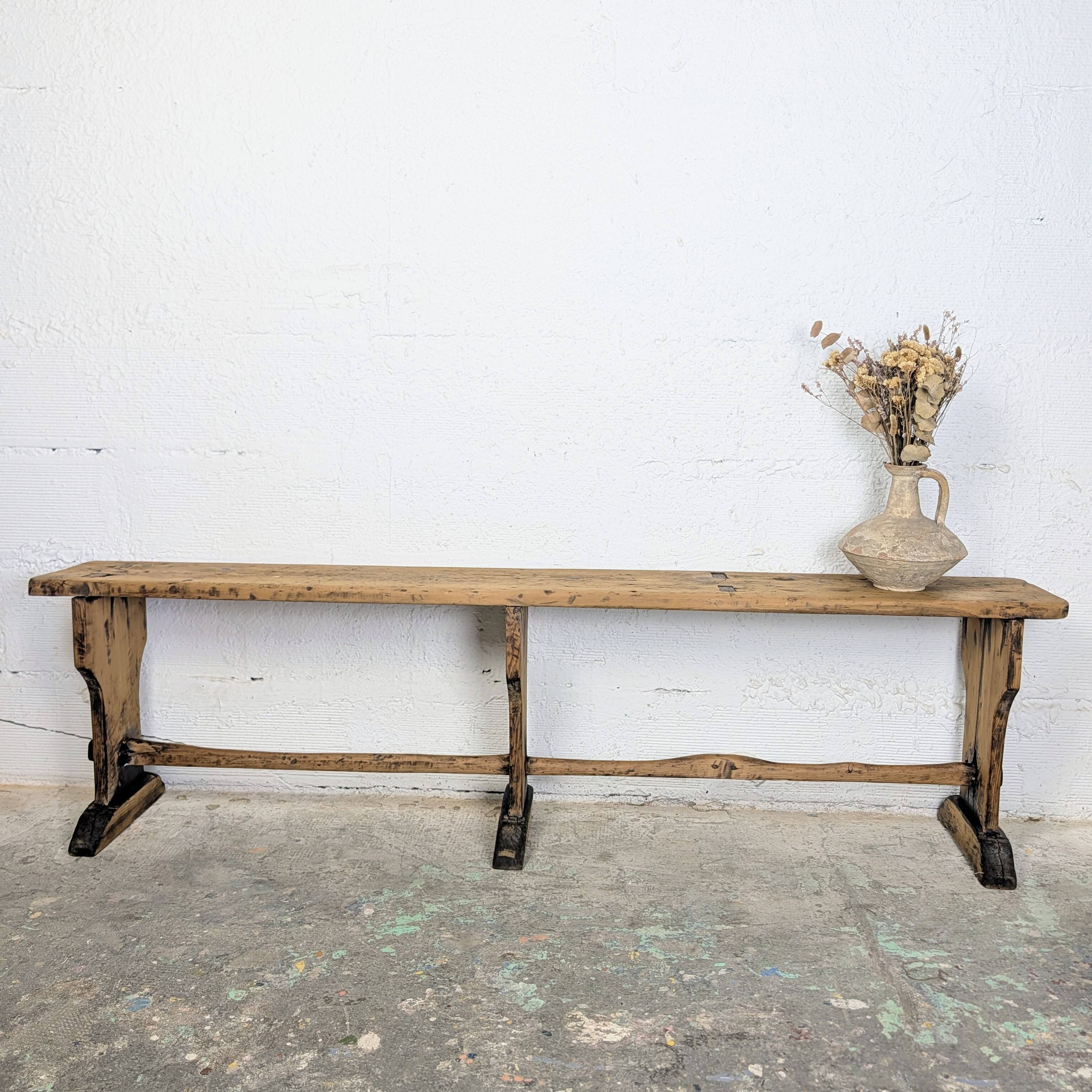 Old farmhouse bench in raw wood