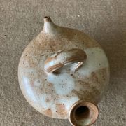 Small sandstone goat in the style of marsh sandstone or hot air balloon