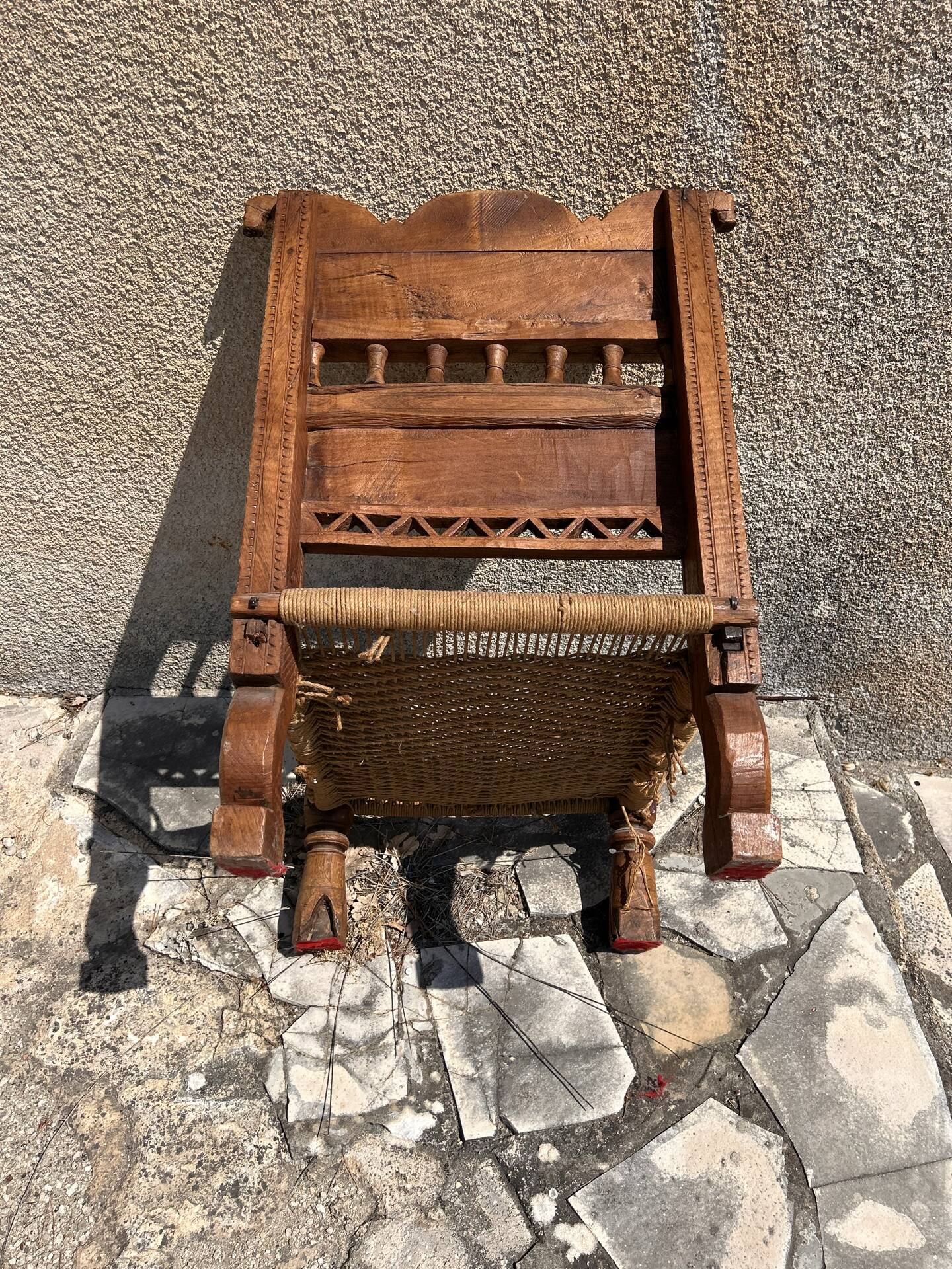 Antique ethnic chair in carved wood