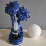 Blue ceramic palm lamp and white opaline globe