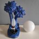Blue ceramic palm lamp and white opaline globe