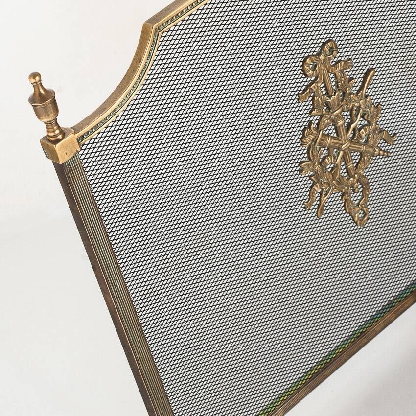 Antique bronze fire screen and fireplace accessories set. Game of seven. France, 1930s