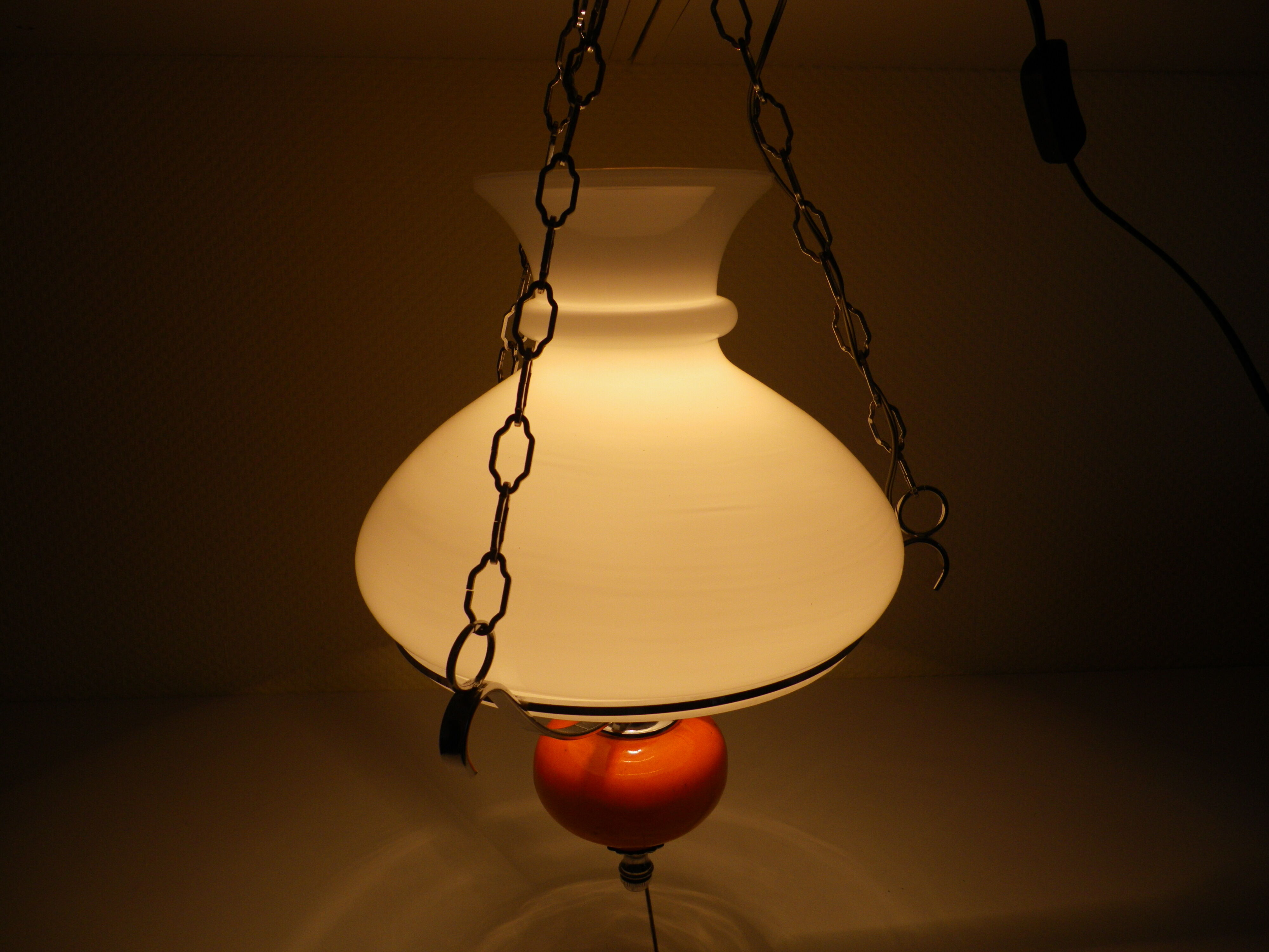 Vintage hanging from the 70s with chrome frame and enamelled orange ball finish