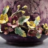 Slip planter with floral decoration