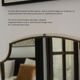 Brass mirror with crest, bead frieze, Italian design style.