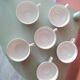 Set of 6 fine and refined cups with red rose decoration.