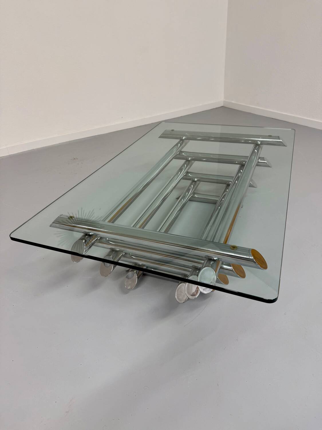 Space coffee table from the 70s, tubular metal and glass, Italian design
