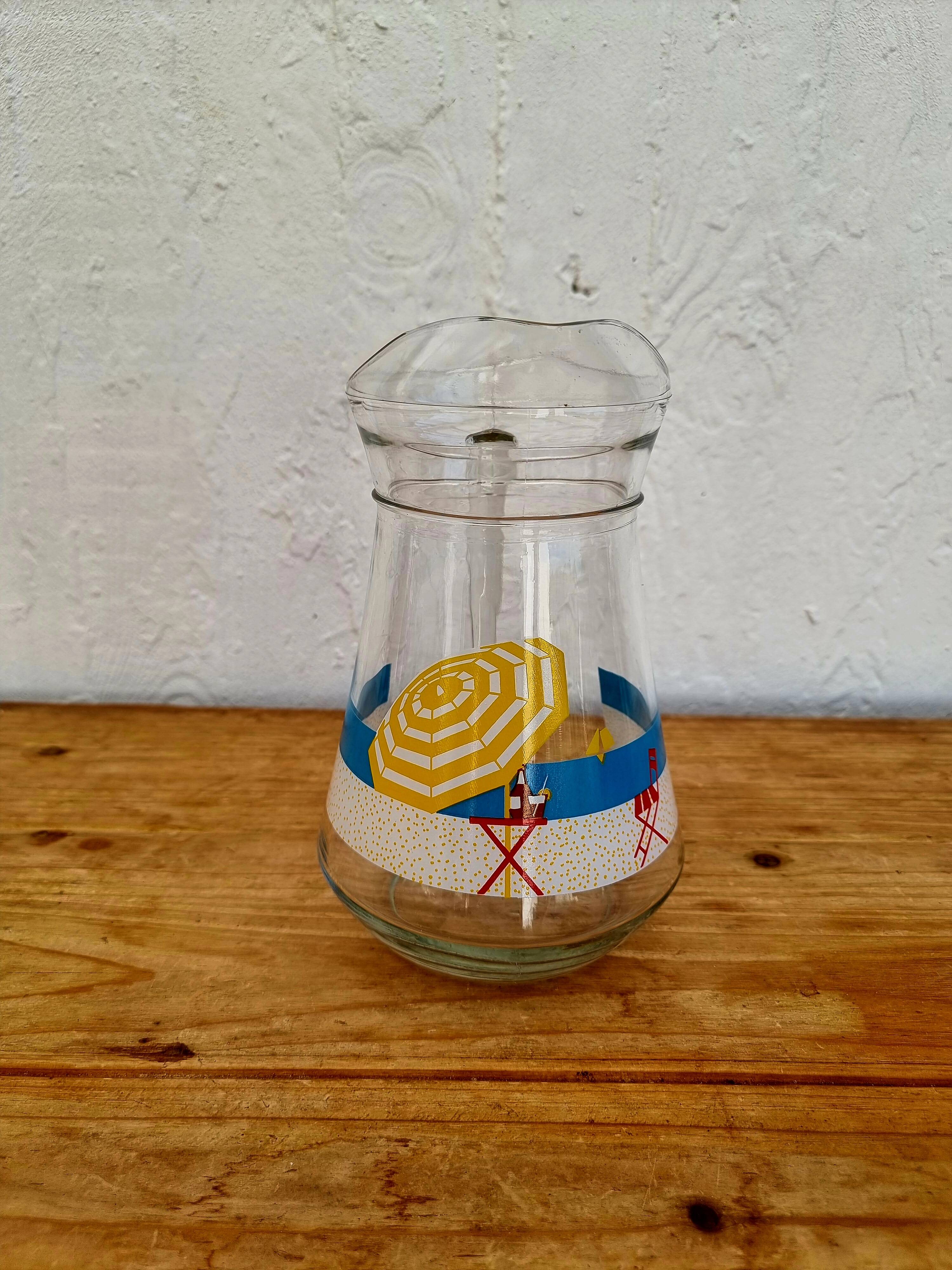 Vintage glass pitcher with summer decor
