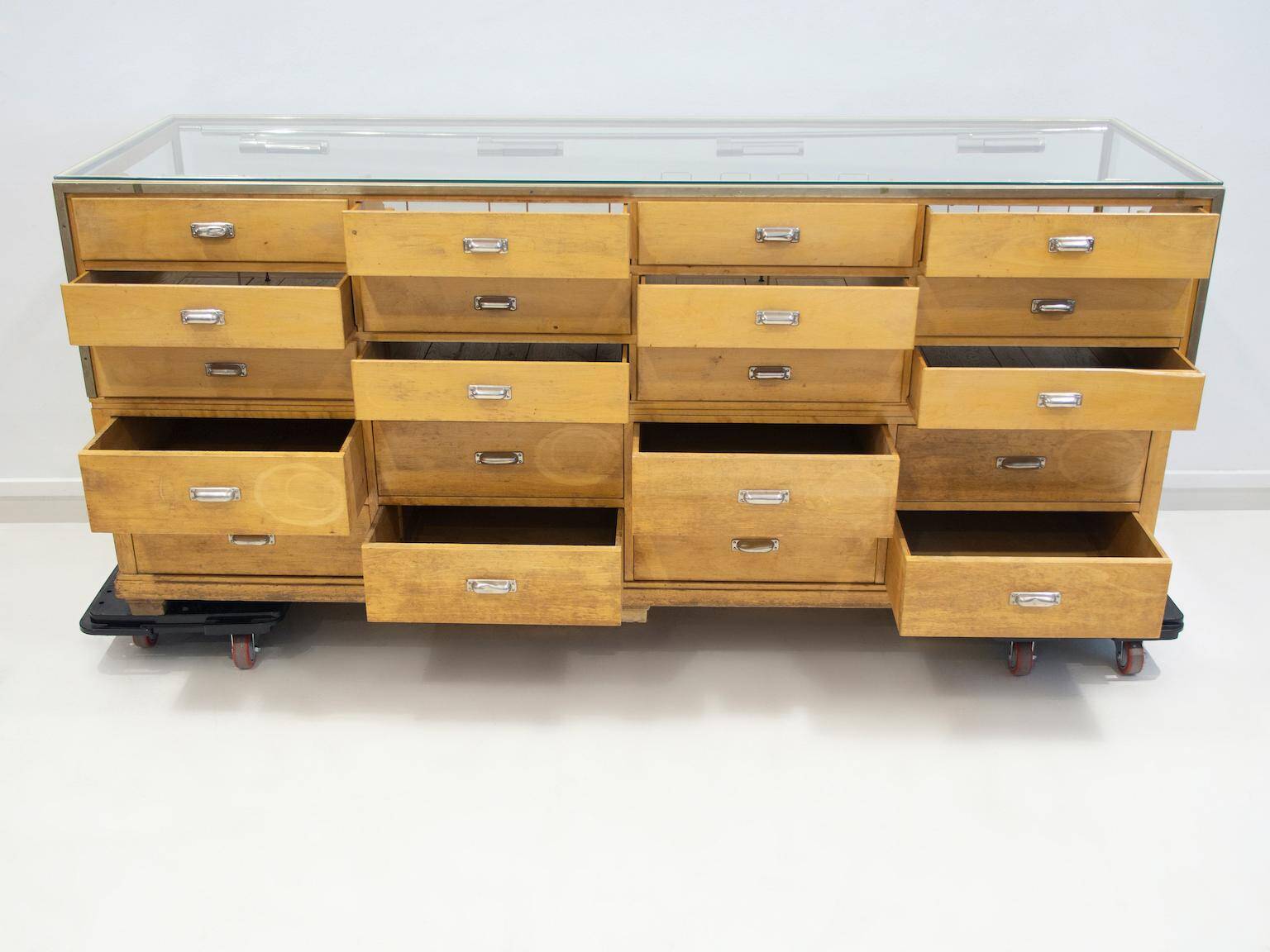 Shop counter made of birch and oak with twenty drawers, 1940s.