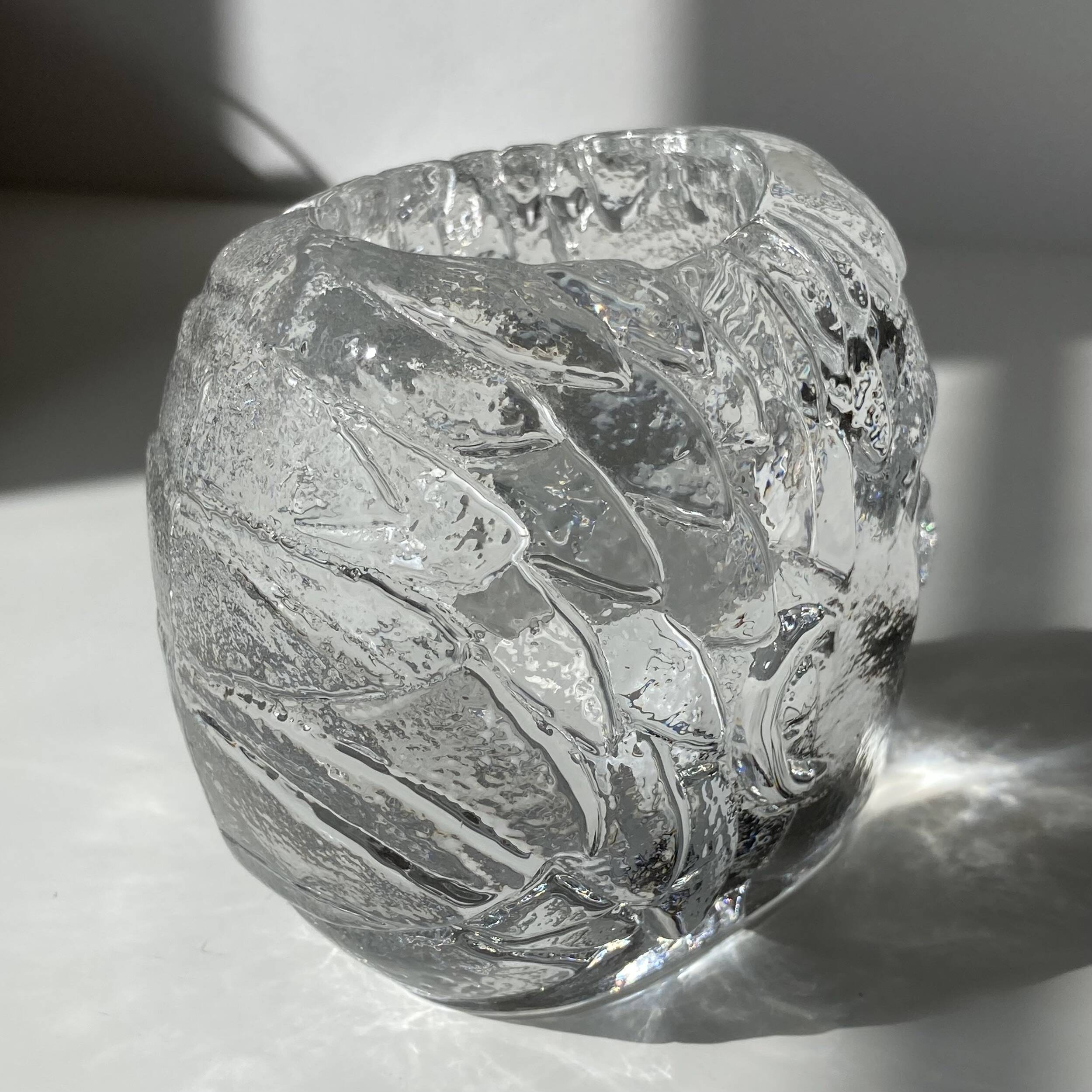 Glass candlestick by Bertil Vallien for Kosta Boda, man's head.