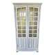 Antique library finished in white with a cerused effect.