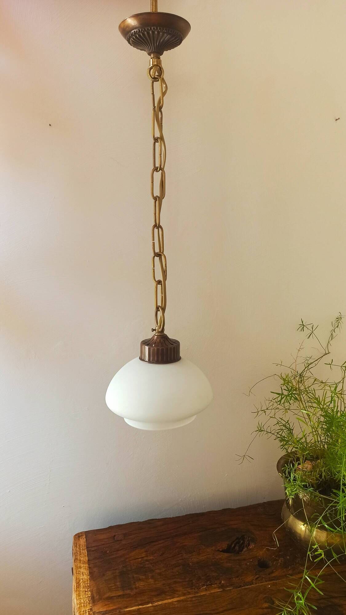Chandelier, brass suspension and white opal.