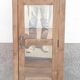 Tall display case in old wood