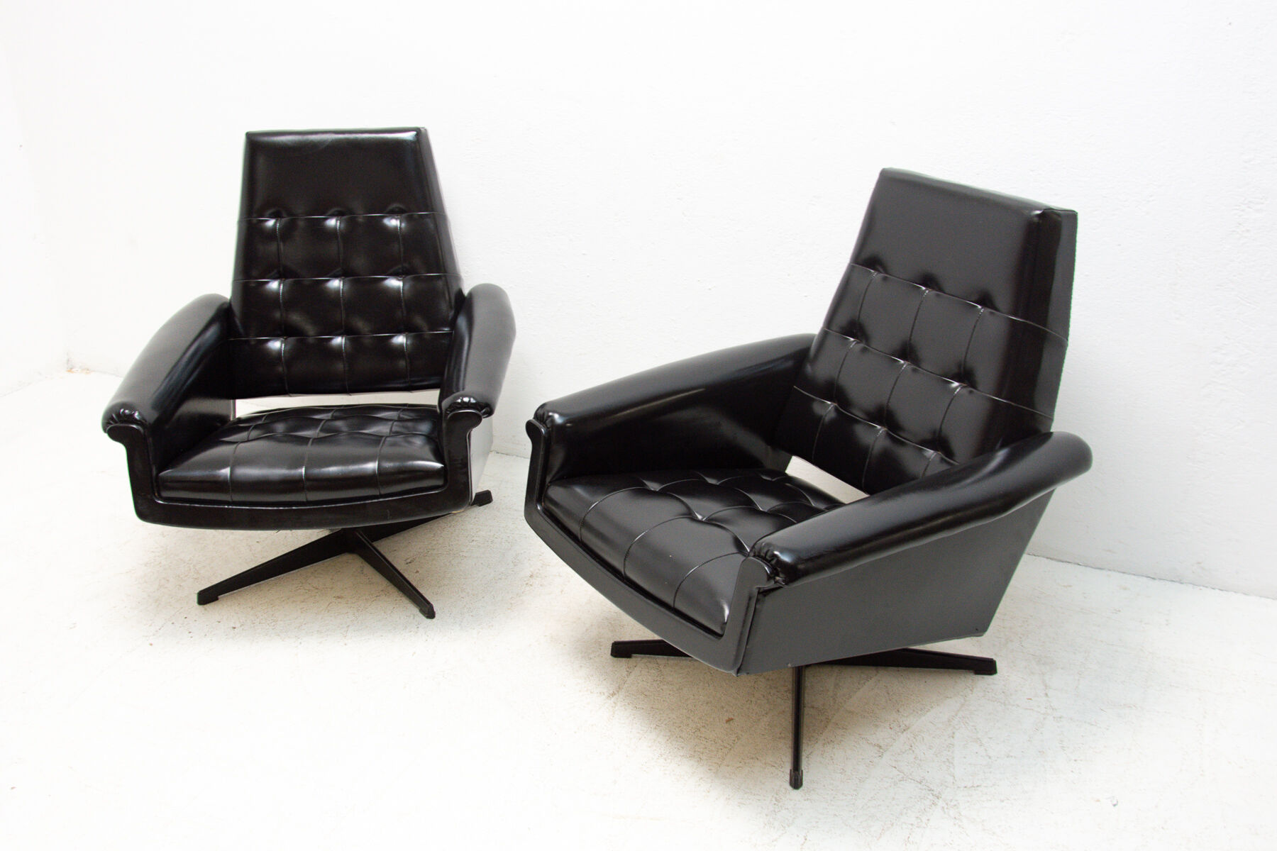Pair of leather swivel armchairs from UP Zavody, 1970´s
