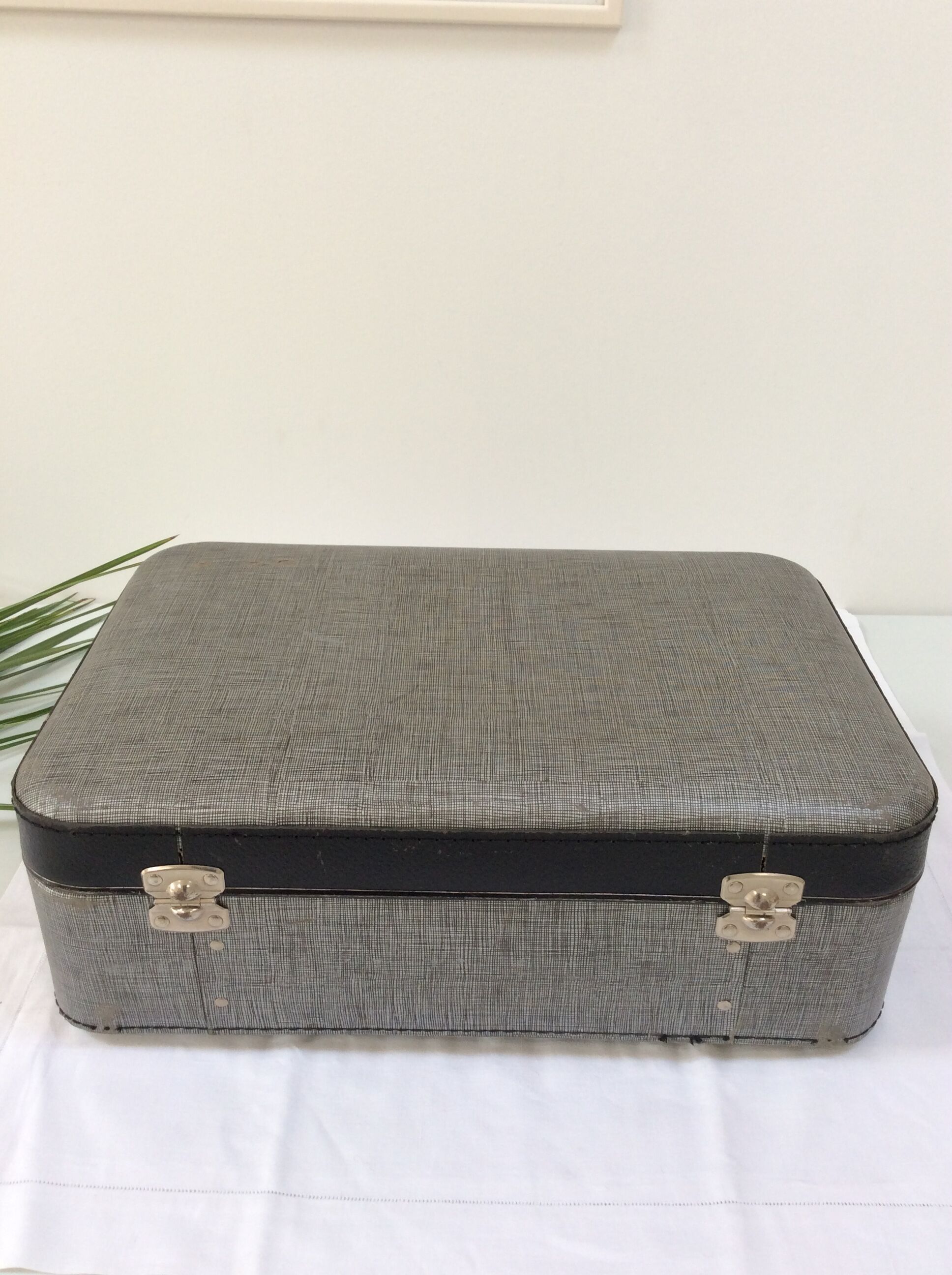 Old gray cardboard suitcase