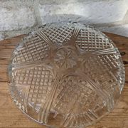 Relief molded glass plate serving dish with rim